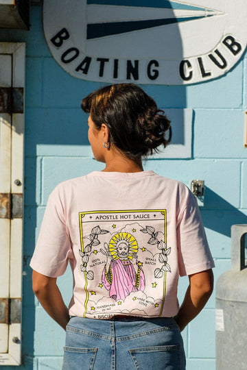 Woman Wearing Hot Sauce T-shirt with Large Illustration on Back 