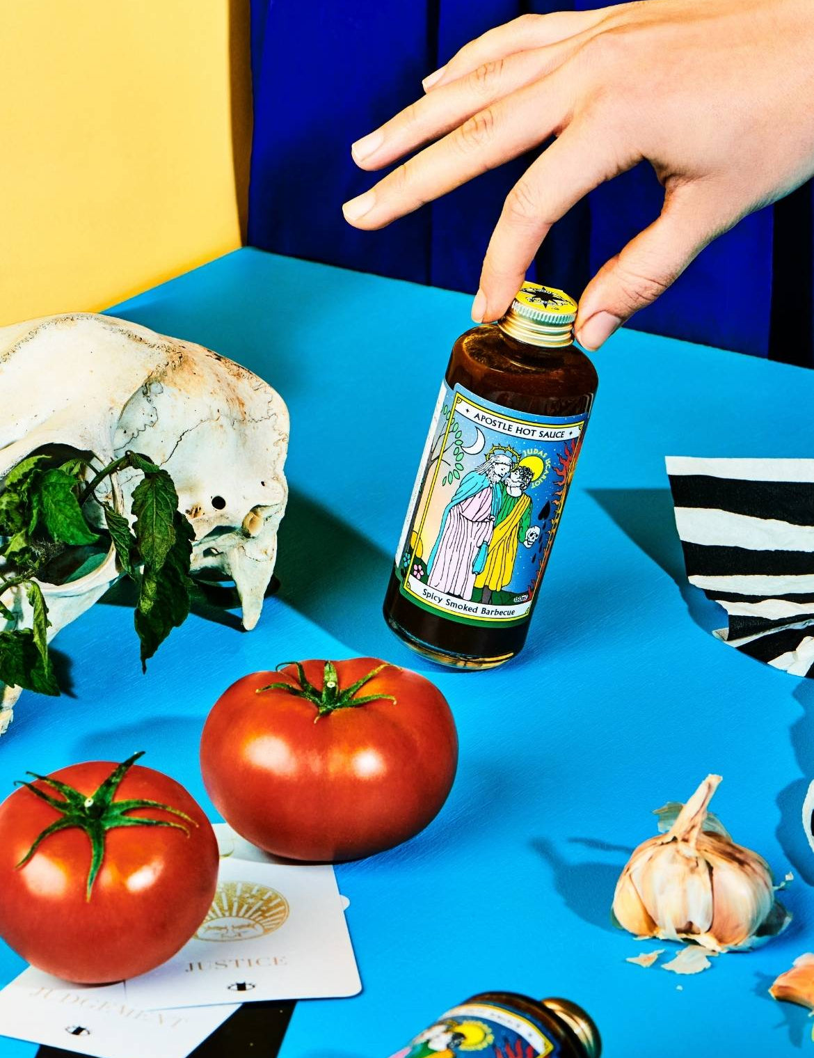 Bottle of Spicy Smoked Barbecue Sauce with hand 
