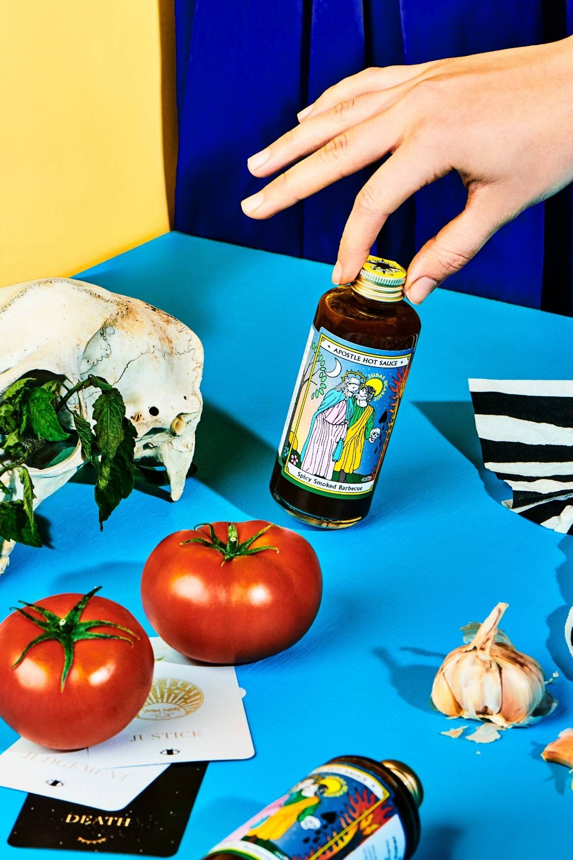 Bottle of Spicy Smoked Barbecue Sauce with hand 